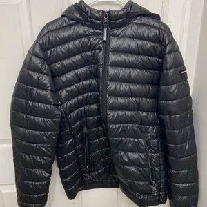 Calvin Klein puffer jacket with hood.